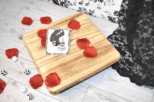 Colored Eye Skull Earring