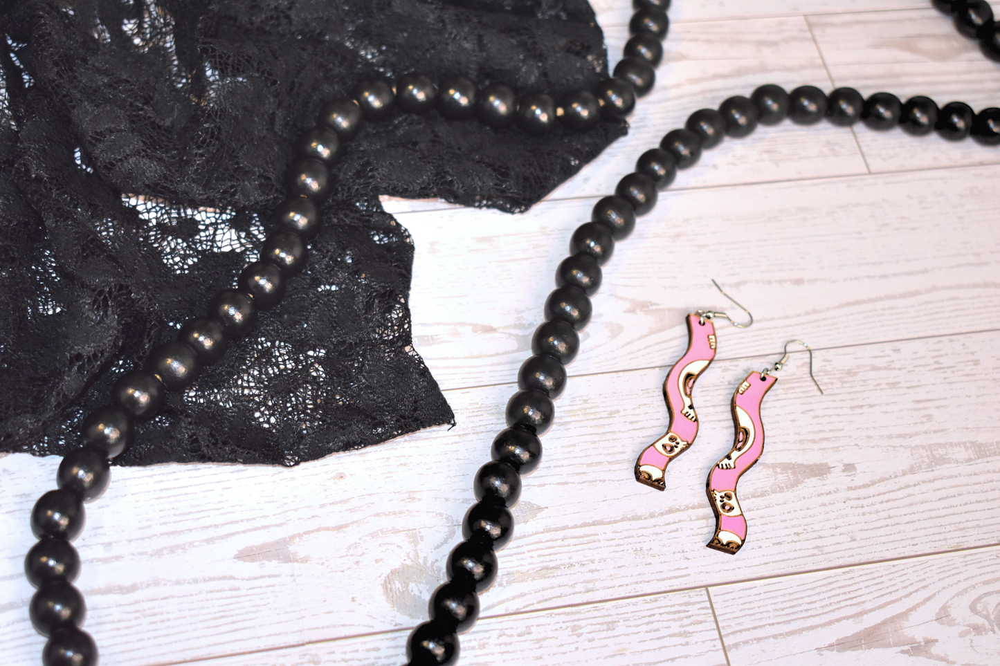 Squiggly Skulls Earring